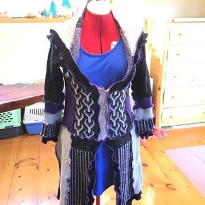 Festival perfect,upcycled sweater pixie coat. Firm